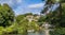 A view along the River Nidd towards the town of Knaresborough in Yorkshire, UK