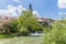 A view along the Selca Sora river past the cathedral in the old town of Skofja Loka, Slovenia