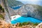 View along the steep cliffs to the famous shipwreck beach, Navagio, on Zakynthos island, Greece