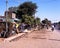 View along a village shopping street with locals going about their business, Jaipur, India.