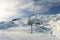 View of an alpine ski slope with chairlift