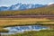 View on Altai lake Dzhangyskol and mountain plateau Eshtykel. North Chui ridge. Russia