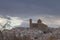 View of Altea church Parroquia De Nuestra SeÃ±ora Del Consuelo on background of dramatic cloudy sky..