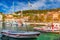 View at amazing archipelago with fishing boats in front of town Hvar, Croatia. Harbor of old Adriatic island town Hvar with