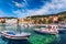 View at amazing archipelago with fishing boats in front of town Hvar, Croatia. Harbor of old Adriatic island town Hvar with