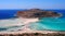 View of the amazing azure waters and white sand beaches of the Balos lagoon in Crete, Greece.