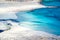 View of the amazing beach of Balos, with a family playing on the tropical sandy beach with turquoise waters