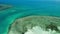 View of amazing coral reefs. Picturesque drone view of tranquil blue sea and beautiful coral reefs near coast of