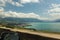 View of the amazing Lake Geneva from highway. Country houses surrounded by green vineyards. Area near Mont Pelerin - mountain of