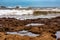 View of the amazing volcanic shore of the Atlantic Ocean in the area of Essaouira in Morocco