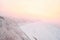 View of the Amur River embankment from the Khabarovsk Cliff in the morning at dawn after heavy snowfall. Trees in the