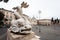 A view of Ancient fish sculpture on the Fontana del Nettuno fountain in Piazza del Popolo People`s Square, Rome