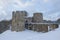 View of the ancient Koporye fortress on a cloudy February day