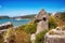 View of ancient Lycian sarcophagus tombs on a mountain near Kekova, lying on a Lycian way. Turkey.