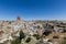 View of ancient Nevsehir cave town and a castle of Uchisar