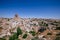 View of ancient Nevsehir cave town and a castle of Uchisar