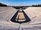 View of the ancient stadium of the first Olympic Games in white marble - Panathenaic Stadium - in the city of Athens, Greece