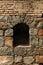 View from the ancient stone window, Medieval stone arch, Medieval arch in stone wall