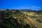 View on ancient village Ronda located on plateau surrounded by rural plains in Andalusia, Spain