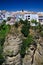 View on ancient village Ronda located precariously close to the edge of a cliff in Andalusia, Spain