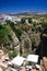 View on ancient village Ronda located precariously close to the edge of a cliff in Andalusia, Spain