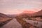 View of the Andes mountain range as seen from VicuÃ±a in the Elqui Valley during the sunset sunrise in Chile