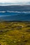 View From Applecross Pass To Scenic Landscape With Curvy Single Track Road And The Isle Of Skye In Scotland