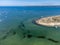 View on Arcachon Bay with many fisherman\\\'s boats and oysters farms near Le Phare du Cap Ferret and Duna du Pilat, Cap Ferret