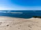 View on Arcachon Bay with many fisherman\\\'s boats and oysters farms near Le Phare du Cap Ferret and Duna du Pilat, Cap Ferret