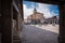 View of the arcaded square of Colmenar de Oreja with the Church of Santa Maria in the background, Spain