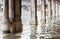 View of the arcades with high water in Venice.