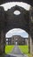 A view through the arched courtyard gates of the Bishop`s Mussenden House on the Downhill Demesne at Castlerock, Northern Ireland