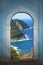 View through arched door, coastal landscape