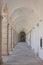 View of the arches in the cloister at Certosa di San Giacomo, also known as the Carthusian Monastery, on island of Capri, Italy.