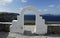 View through archway to aegean sea of santorini island