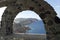 View through archway to aegean sea of santorini island