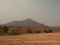 A view on the arid mountains with smog in summer in northern Thailand. Air pollution that affects health