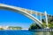 View of Arrabida Bridge in Porto Portugal, crossing the Douro River and linking Porto with Vila Nova de Gaia