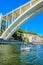 View of Arrabida Bridge in Porto Portugal, crossing the Douro River and linking Porto with Vila Nova de Gaia