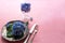 View of an assortment of edible flowers with plate and fork