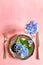 View of an assortment of edible flowers with plate and fork