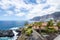 View on the Atlantic ocean, mountains and cliffs, natural pool and town Los Gigantes. Canary Island, Tenerife, Spain