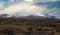 View during auto trip in West Iceland, Snaefellsnes peninsula, View Point near Svortuloft Lighthouse. Spectacular black volcanic