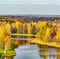 View of the autumn trees in the Gatchina park from the observation tower of the Grand Palace