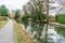 A view away from town along the towpath beside the frozen Grand Union canal in Market Harborough