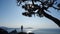 The view from the back of sporty young girl who stands on Mount in Sudak, Crimea. Silhouette of sports woman tourist