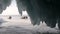 View of the Baikal ice and the excursion cars standing on it from the ice cave with long icicles