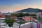 View from a balcony on roofs of many buildings and hotels