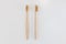 View of bamboo toothbrush front and side. Horizontal orientation.