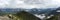 View of Banff National Park in the Canadian Rockies from the top of a mountain after taking the Banff Gondola; panorama